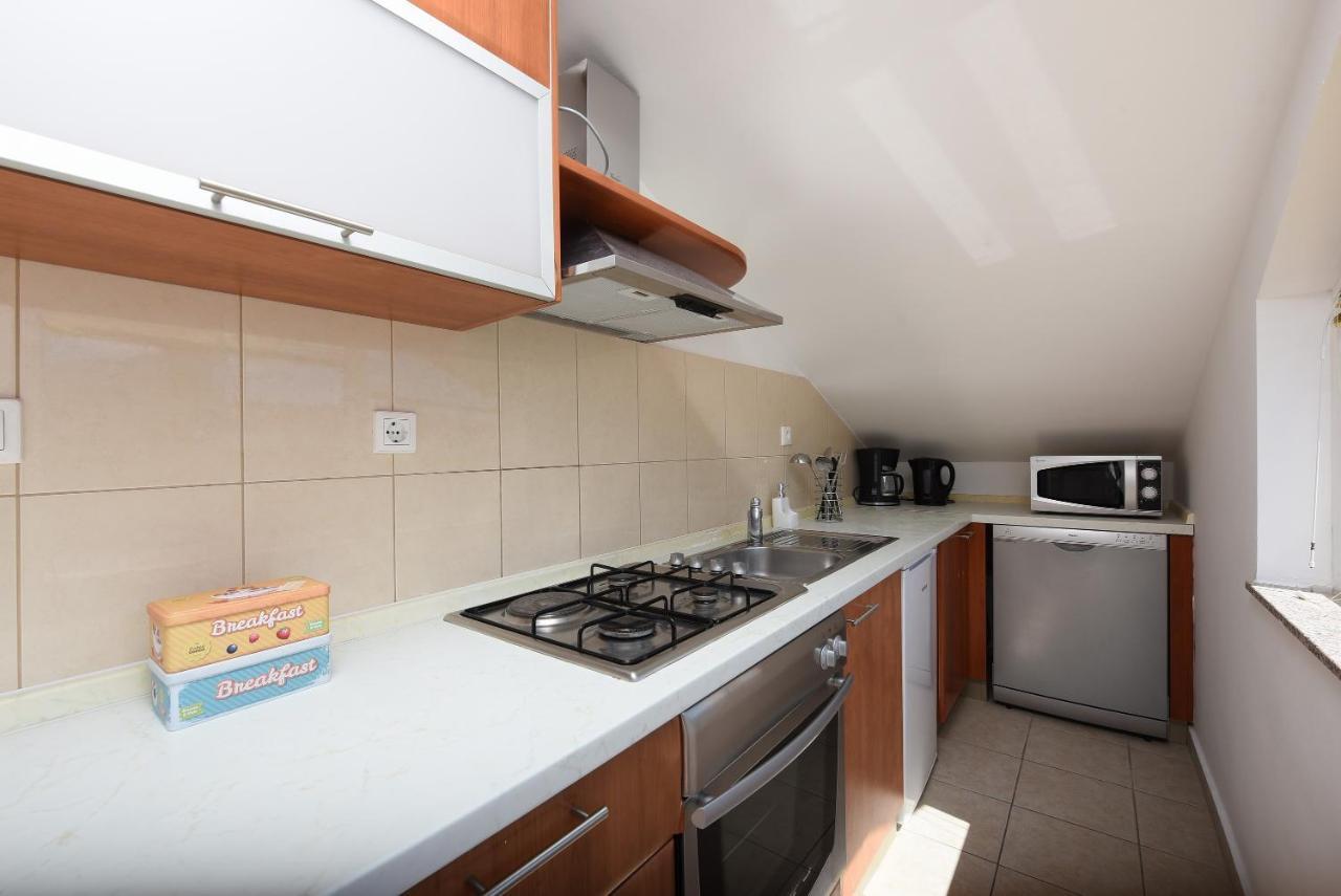 Sunset Beach Suites Kozino Bagian luar foto