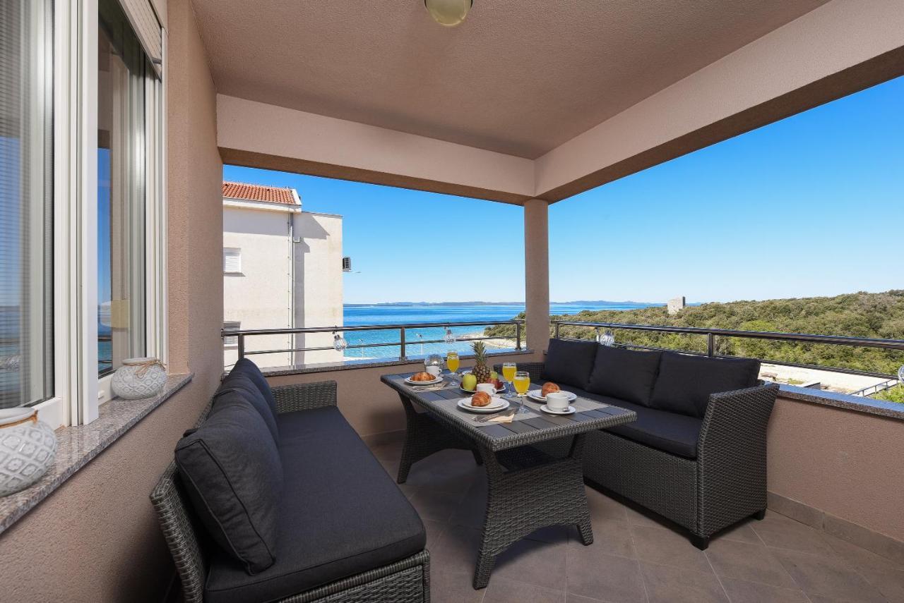 Sunset Beach Suites Kozino Bagian luar foto