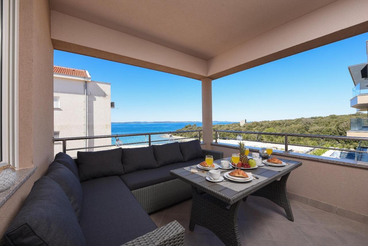 Sunset Beach Suites Kozino Bagian luar foto