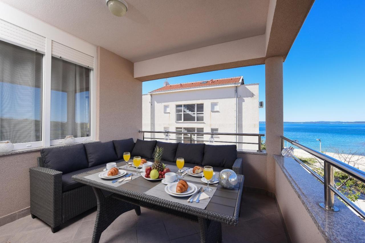 Sunset Beach Suites Kozino Bagian luar foto
